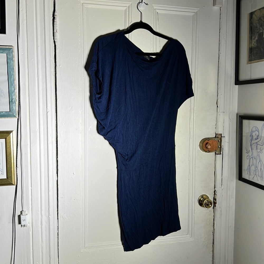 Blue mini skirt dress with asymmetrical Flowey top